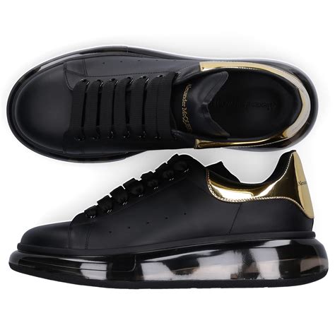 alexander mcqueen gold sneakers.